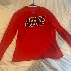 Red and black Nike shirt
